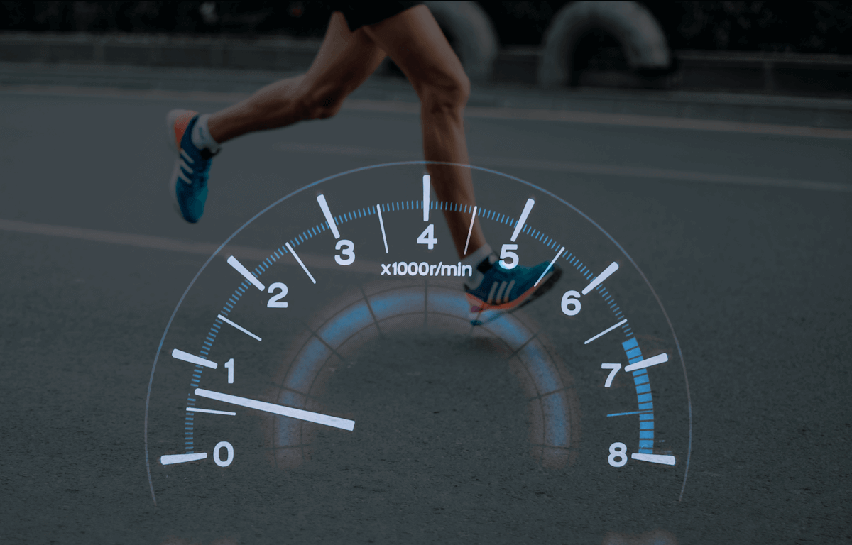 Tachometer and running legs on road.